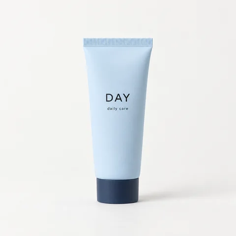 DAY blue daily-care tube on a clean studio background