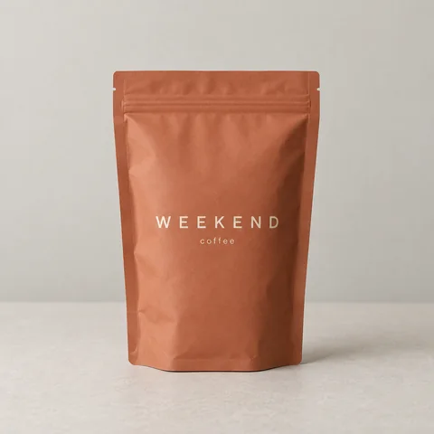 WEEKEND coffee pouch on a neutral studio background